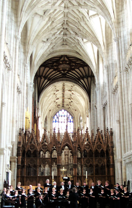 The high-vaulted Winchester Cathedral, with choristers