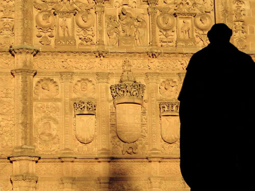 Luis de Leon O.S.A. facing the facade of the University of Salamanca