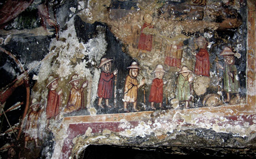 Fresco above a doorway at a pilgrim hostel on the Via Francigena