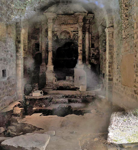 A view from a window looking into the locked chapel. The sanctuary (altar end) is seen in the distance.