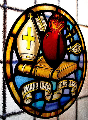 Augustinian crest in stained glass at the Priory in Hammersmith, London