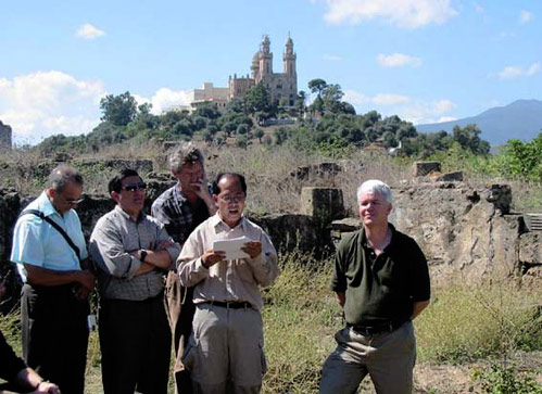 Augustinians visit Hippo, with Annaba high in the background