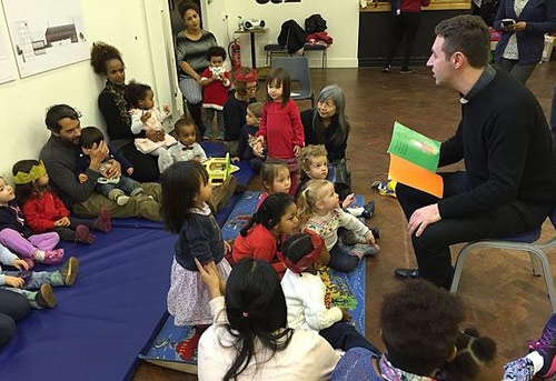 An Augustinian helping with catechetical instruction at Hammersmith