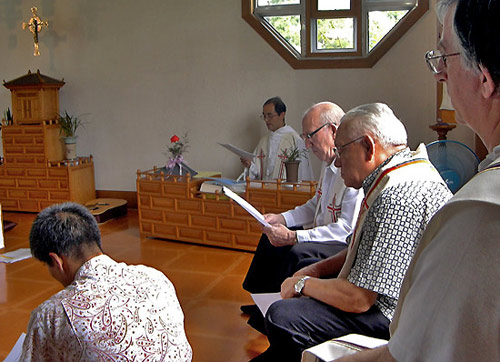 Prayer at the community chapel at Kang-Hwa, south Korea.