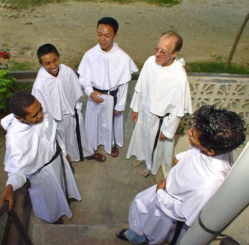 Augustinian novices vested in the traditional white habit.