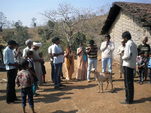 An Augustinian visits a regional area in India and leads in prayer.