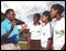 W09  Fr Paul O.S.A. at St Augustinus high school, Sorong.